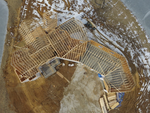 image of top aerial view of roof truss on home under construction